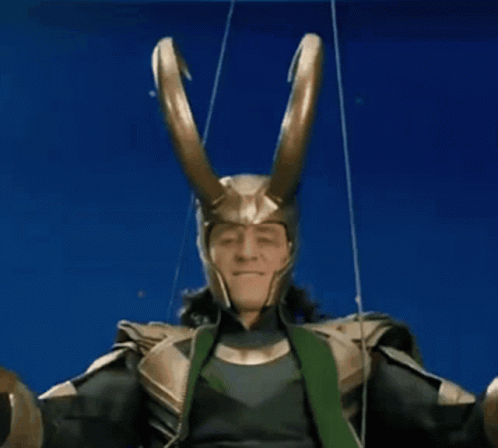 A Man In A Loki Costume Is Giving Two Thumbs Up . GIF