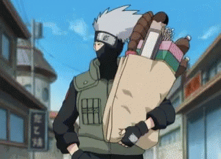 A Man In A Mask Is Carrying A Bag Of Groceries GIF