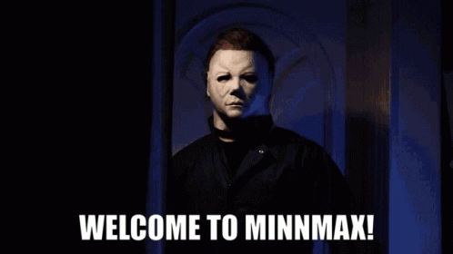 A Man In A Mask Is Waving In Front Of A Sign That Says Welcome To Minmax GIF