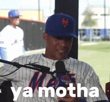 A Man In A Mets Jersey Is Talking Into A Microphone With Ya Motha Written On The Bottom GIF