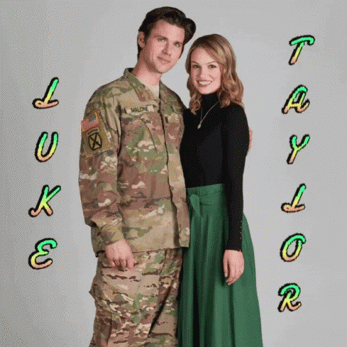 A Man In A Military Uniform And A Woman In A Green Skirt Are Posing For A Picture GIF