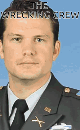 A Man In A Military Uniform And Tie With The Words The Wrecking Crew Written Above Him GIF
