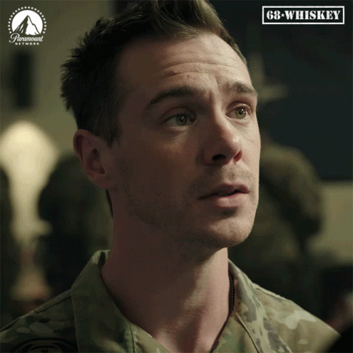 Man In Military Uniform With GB Whiskey Logo GIF