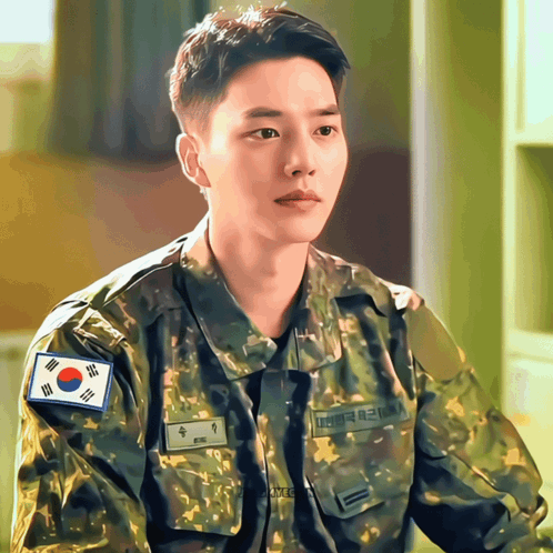 Man In Military Uniform With Sung Name Tag GIF