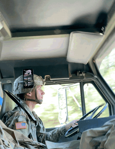 A Man In A Military Uniform Has An American Flag Patch On His Sleeve GIF