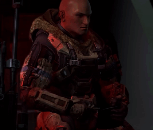 A Man In A Military Uniform Has The Letter C On His Sleeve GIF