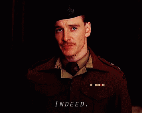 A Man In A Military Uniform Has The Word Indeed On His Chest GIF