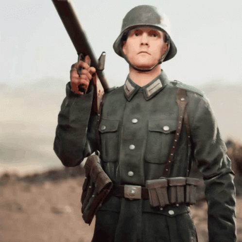 A Man In A Military Uniform Holds A Rifle GIF