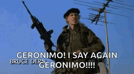 A Man In A Military Uniform Is Holding A Gun And Says Geronimo ! I Say Again Bruce Der Geronimo !!! GIF