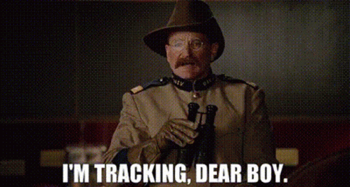 A Man In A Military Uniform Is Holding A Gun And Says `` I 'M Tracking , Dear Boy '' . GIF