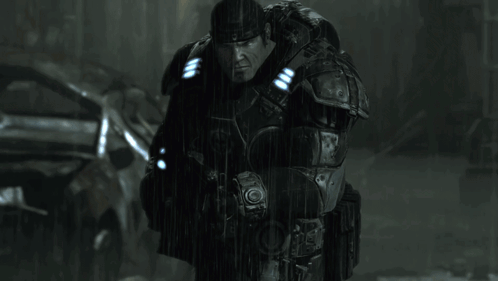A Man In A Military Uniform Is Holding A Gun With A Blue Light On It GIF