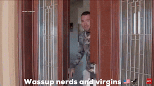A Man In A Military Uniform Is Peeking Out Of A Door With The Caption Wassup Nerds And Virgins GIF