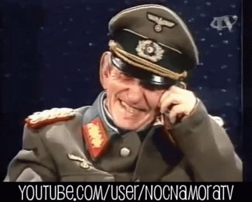 a man in a military uniform is smiling with youtube.com/user/nocnamoratv written below him