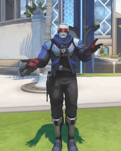 A Man In A Military Uniform Is Standing On A Grassy Field GIF