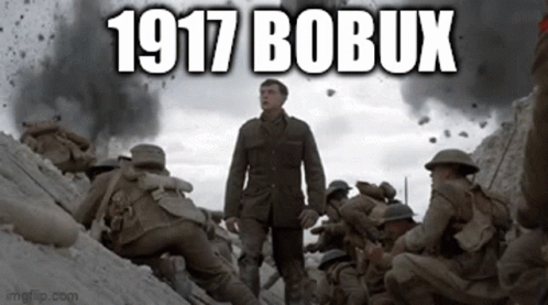 A Man In A Military Uniform Is Walking Through A Trench With Soldiers . GIF