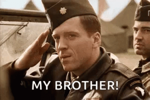 A Man In A Military Uniform Salutes While Another Man Says `` My Brother ! '' GIF