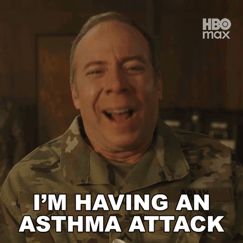 A Man In A Military Uniform Says I 'M Having An Asthma Attack While Using An Inhaler GIF
