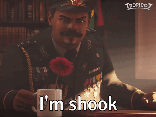 A Man In A Military Uniform Says " I 'M Shook " In Front Of A Bookshelf GIF