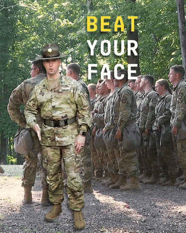 A Man In A Military Uniform Stands In Front Of A Group Of Soldiers With The Words Beat Your Face Written Above Him GIF