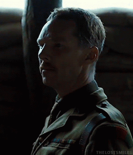 Man In Military Uniform Looking At Something GIF