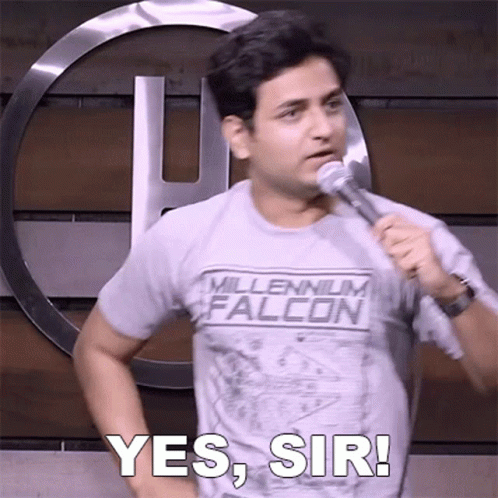 A Man In A Millennium Falcon Shirt Is Holding A Microphone And Says Yes Sir GIF