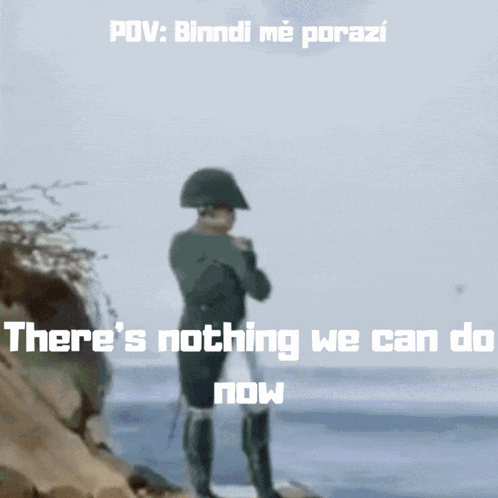 A Man In A Napoleon Hat Stands On A Beach With The Words " There 'S Nothing We Can Do Now GIF