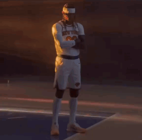 A Man In A New York Jersey Stands On A Court GIF