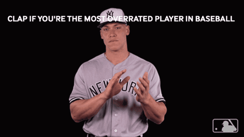 A Man In A New York Yankees Uniform Is Clapping GIF