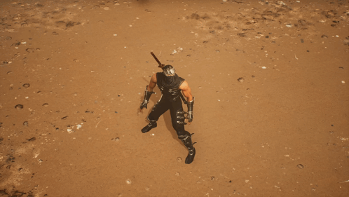 a man in a ninja costume is holding a sword in his right hand