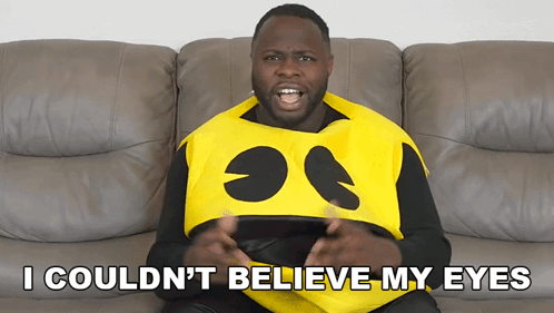 A Man In A Pac Man Costume Is Sitting On A Couch And Says I Couldn T Believe My Eyes GIF
