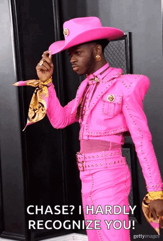 A Man In A Pink Cowboy Outfit Says " Chase I Hardly Recognize You " GIF