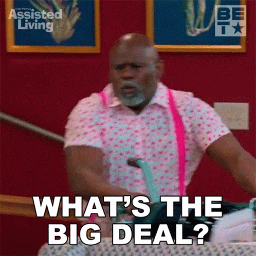 A Man In A Pink Shirt And Pink Suspenders Is Asking What 'S The Big Deal GIF
