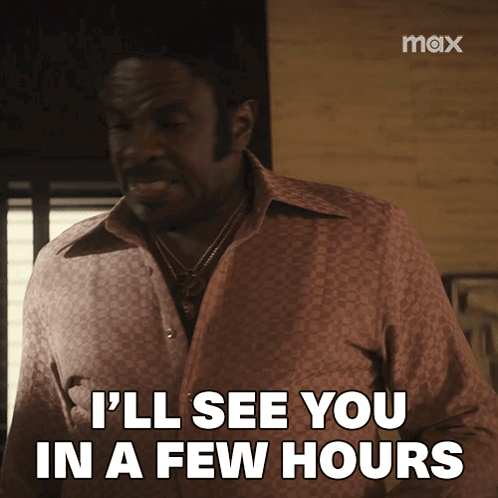A Man In A Pink Shirt Is Saying I 'Ll See You In A Few Hours GIF