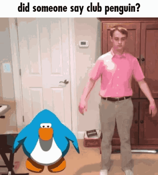 A Man In A Pink Shirt Is Standing Next To A Penguin In A Room GIF