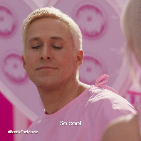 A Man In A Pink Shirt Says " So Cool " In Front Of A Pink Background GIF
