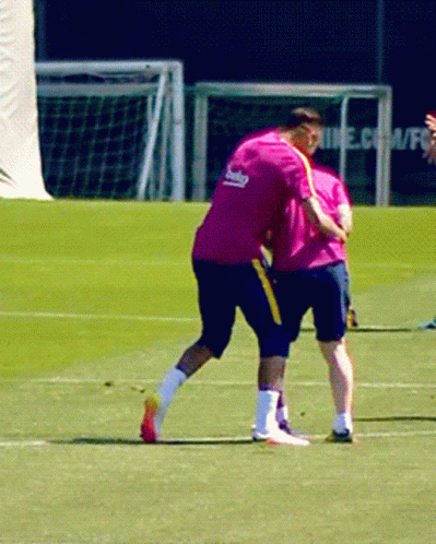A Man In A Pink Shirt With The Word Beko On It GIF
