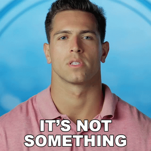 a man in a pink shirt with the words it 's not something on the bottom