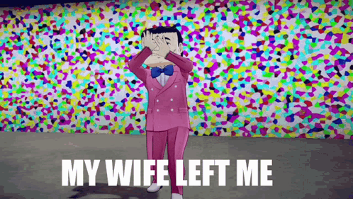 A Man In A Pink Suit And Bow Tie Is Standing In Front Of A Colorful Wall Covering His Eyes With His Hands . GIF
