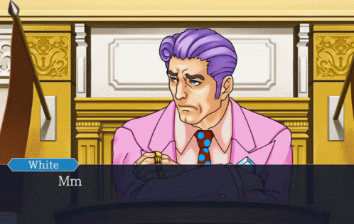 A Man In A Pink Suit And Tie Is Sitting In A Courtroom With The Words White Mm On The Bottom Left GIF