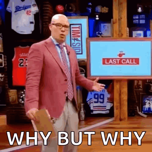 A Man In A Pink Suit And Tie Is Standing In Front Of A Screen That Says Last Call GIF