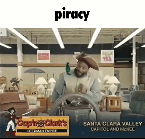 A Man In A Pirate Costume Is Driving A Steering Wheel In A Store . GIF