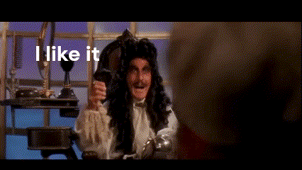 A Man In A Pirate Costume Is Holding A Glass Of Wine And Saying I Like It GIF