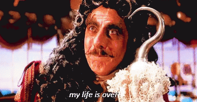 A Man In A Pirate Costume Is Holding A Hook And Says " My Life Is Over " GIF