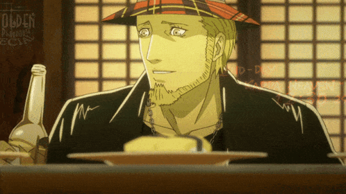 A Man In A Plaid Hat Sits At A Table With A Plate Of Food And A Bottle GIF