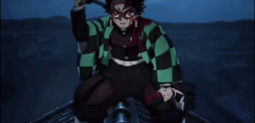 A Man In A Plaid Jacket Is Holding A Sword GIF