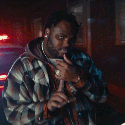 A Man In A Plaid Jacket Says I Ain T Goin ' GIF
