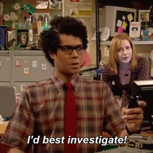 A Man In A Plaid Shirt And Tie Is Holding A Cell Phone And Saying `` I 'D Best Investigate ! '' GIF