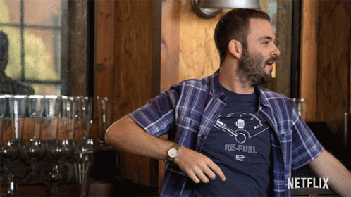 Man In Plaid Shirt With Re-Fuel Shirt GIF