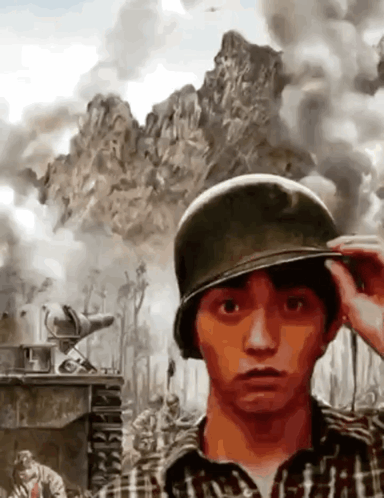 Man In Plaid Shirt Adjusting Helmet In Front Of Mountain GIF