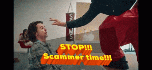 A Man In A Plaid Shirt Is Being Kicked In The Face By A Man In Red Shorts GIF